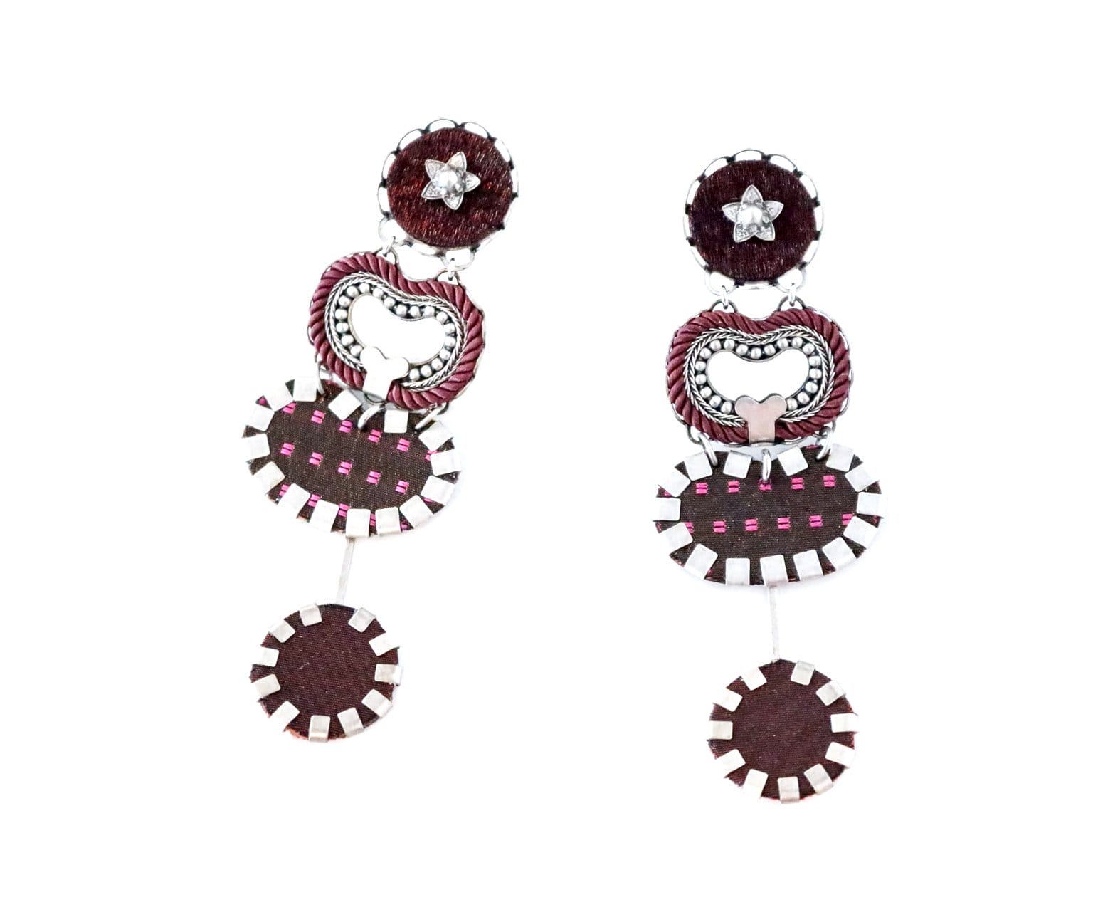 Earrings by Ayala Bar are a stunning pair of unique, handcrafted earrings featuring a mix of dark red and silver elements. These earrings boast three distinct sections: a circular top adorned with a star emblem, a middle ring showcasing intricate braided detail, and a bottom disc with an elegant patterned surface. An added touch includes detachable decorative matching studs.