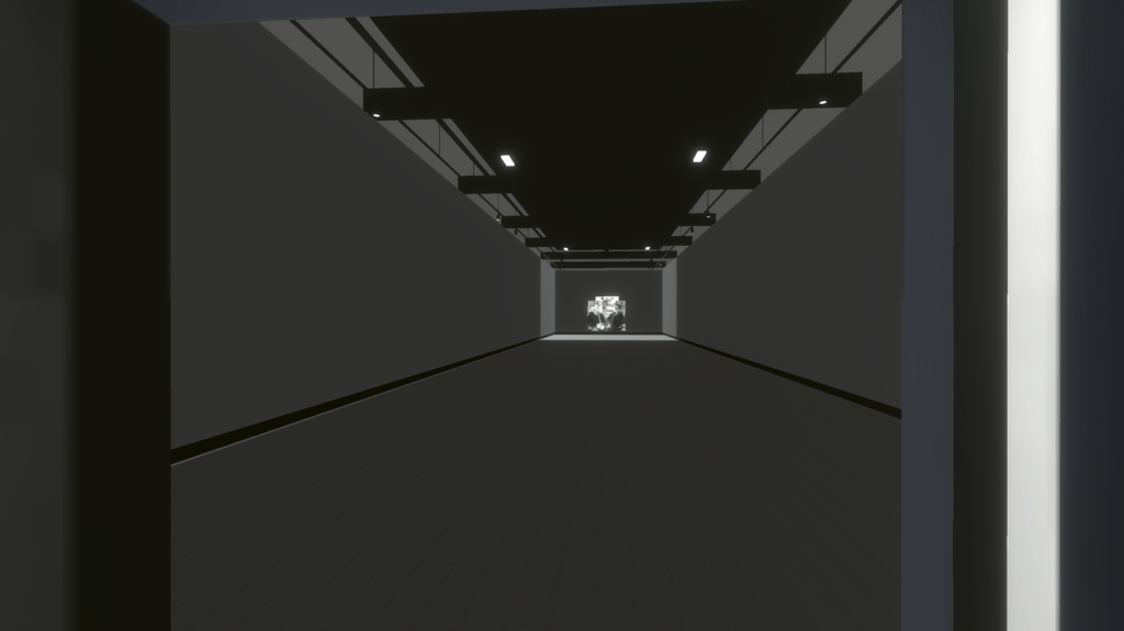 A long, dark corridor with white walls and ceiling lights. At the end of the corridor, a distant, illuminated artistic display stands out against the dim surroundings.