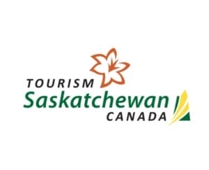 The logo of Tourism Saskatchewan showcases an orange floral design above the words "Tourism Saskatchewan Canada" in green and black text, a nod to Beads in the Blood. A stylized yellow and green graphic element graces the bottom right.