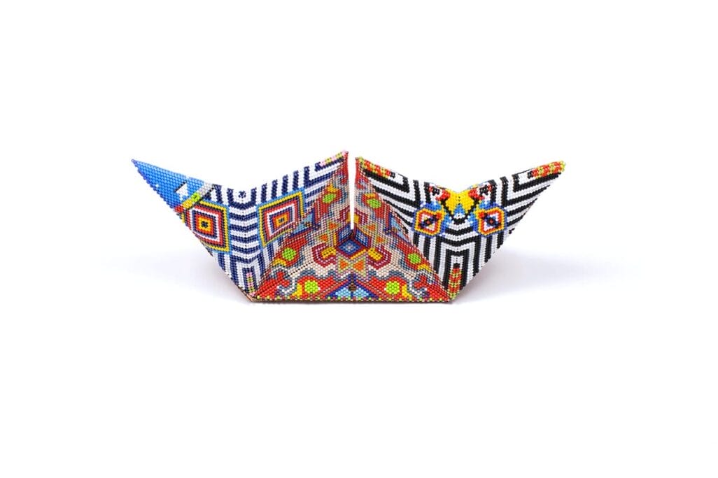 Geometric shape, vibrantly beaded in front of a white background titled 