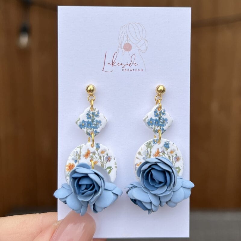 A hand holds a card labeled 