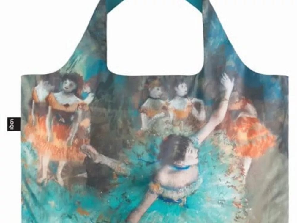 A Tote Bag with Edgar Degas Artwork featuring ballet dancers. The dancers are dressed in vibrant costumes, including blue and orange tutus. The bag's handles and background are turquoise, adding a modern touch to the classic painting.