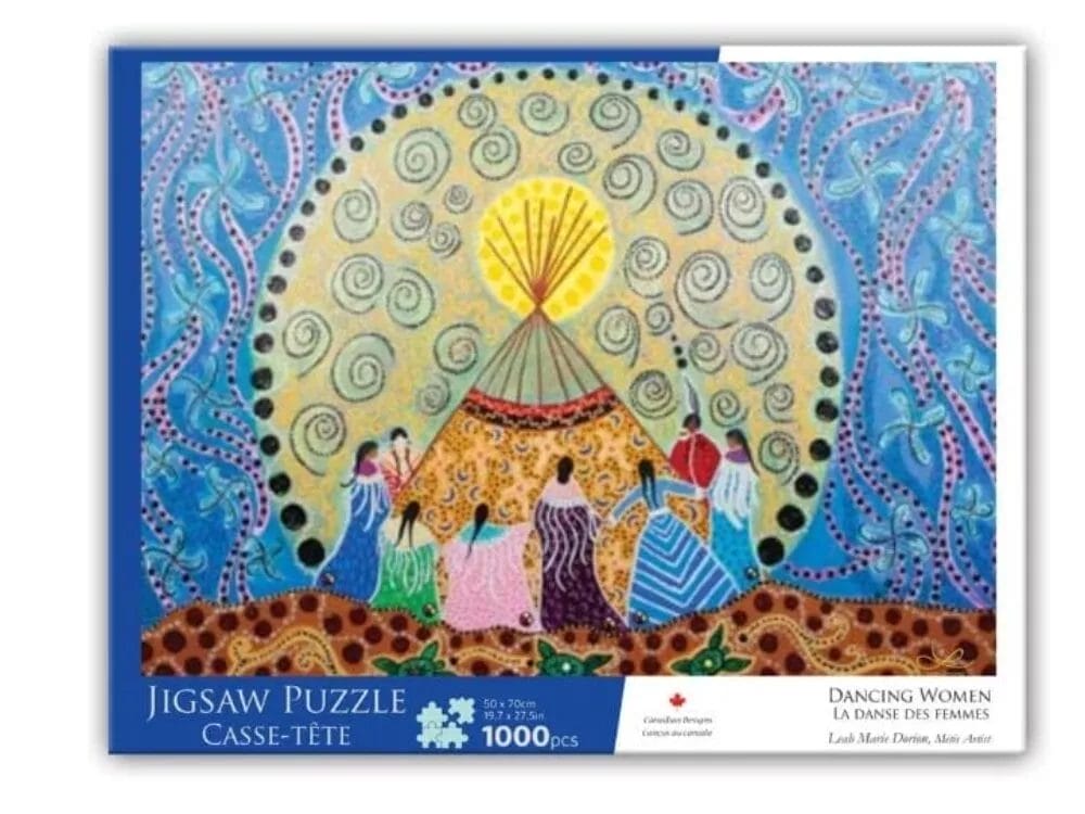 The DORION - Puzzle, Dancing Woman is a 1000-piece jigsaw featuring artwork of women in vibrant dresses dancing around a teepee beneath a swirling, decorated sky. The colorful box highlights the 